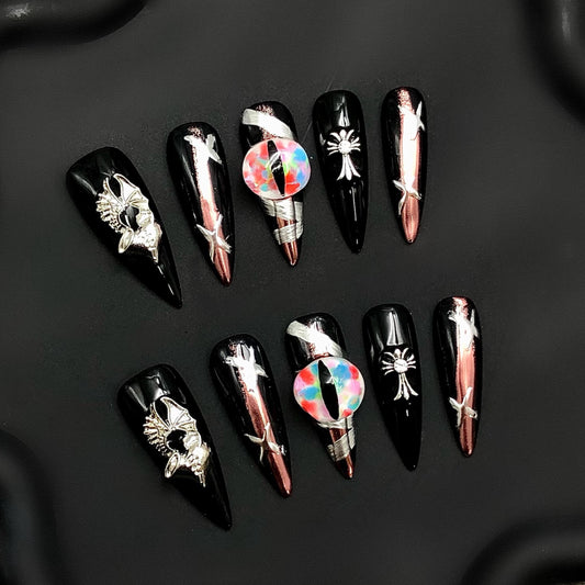 medium stiletto press on nails glue on black chrome gothic 3d metallic holographic edgy spiked avant garde nails rose gold high fashion arty