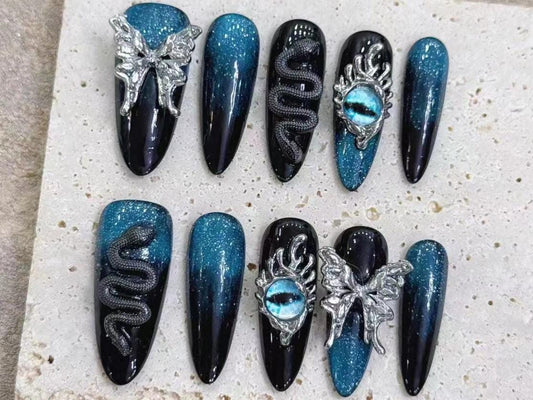 press on nails long stiletto midnight blue black glitter 3d fantasy nail art snake butterfly eye embellishment gothic glam celestial cosplay