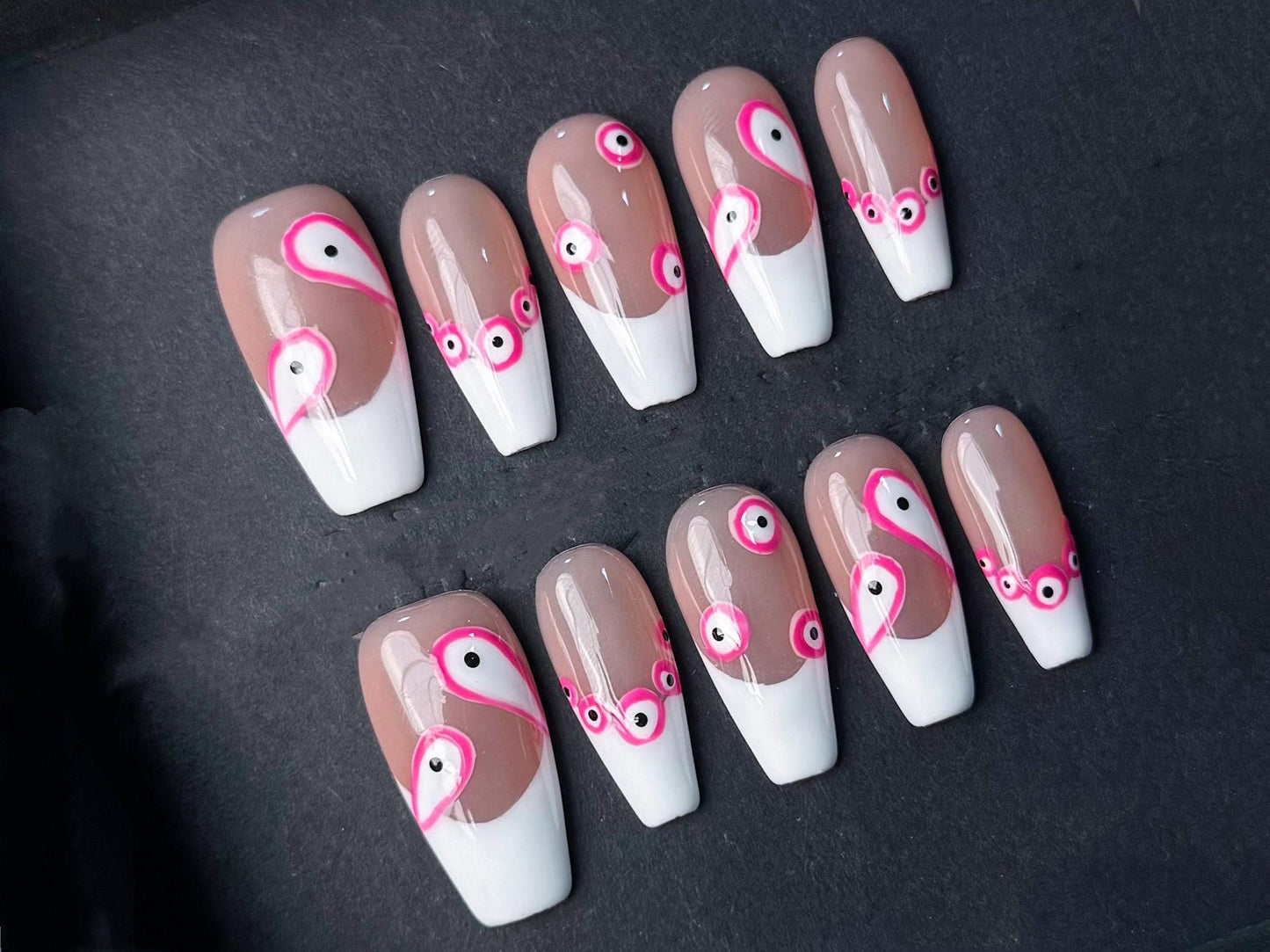 abstract nails, pink and white evil eye modern art, geometric nude base glossy press on trendy minimalistic design, pink accents, unique