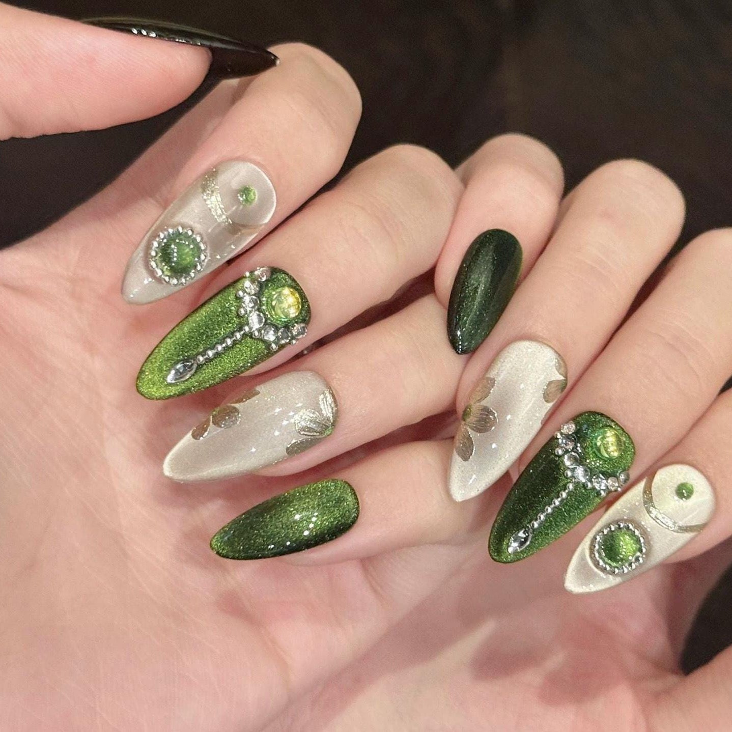 Emerald Envy Press-On Nails – Green & Gold Gemstone Glam Set glue on luxe medium almond emerald green champagne shimmer ornate rhinestones