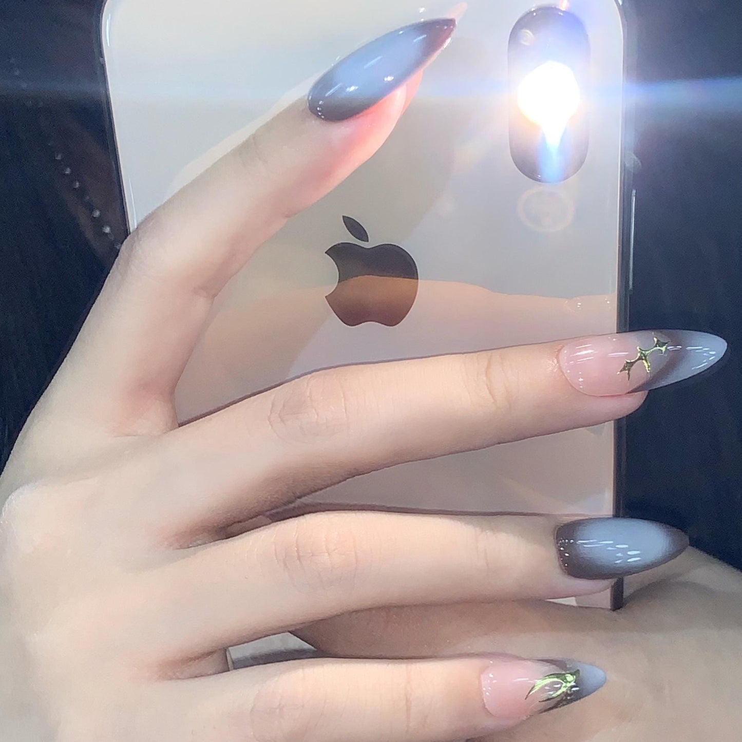 Nude black ombré nails almond-shaped press-on gold nail art elegant manicure minimalist nail style modern nail fashion, glossy subtle luxury