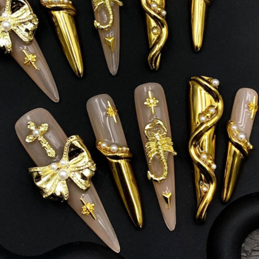 Golden Scorpion Luxe Press-On Nails Nude Stilettos with 3D Charms & Pearl Accents Manicure glue on artificial fake faux reusable trendy nail