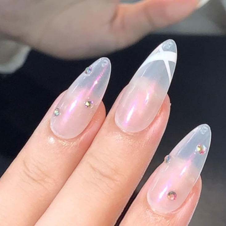 Chic Iridescent Press-On Nails with Bold White X Design and Sparkling Rhinestone Accents for a Sleek, Modern Look