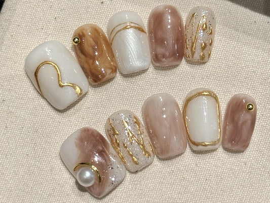 Elegant Mocha Swirl Press On Nails with Gold Accents and Pearl Charm Manicure glue on artificial fake faux reusable trendy neutral nail