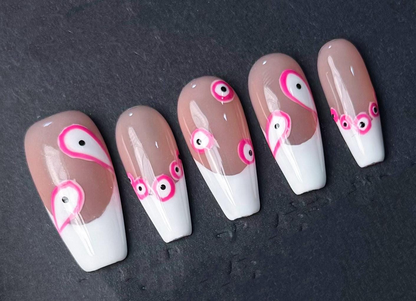 abstract nails, pink and white evil eye modern art, geometric nude base glossy press on trendy minimalistic design, pink accents, unique