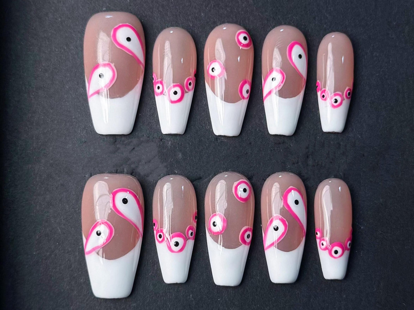 abstract nails, pink and white evil eye modern art, geometric nude base glossy press on trendy minimalistic design, pink accents, unique