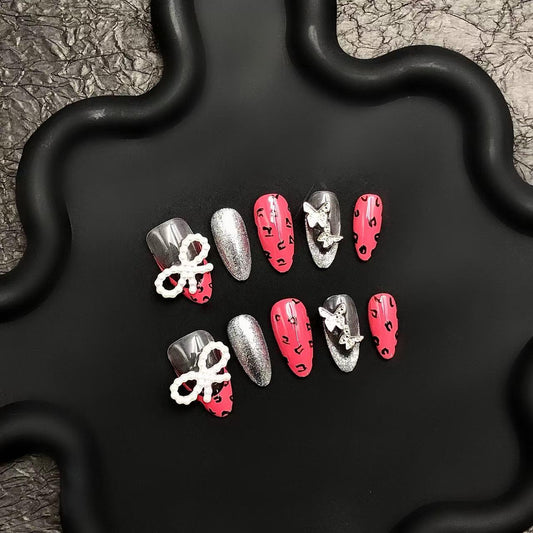 Pink Chrome Leopard Nails – Glitter & 3D Bow Accents glue on artificial faux nails