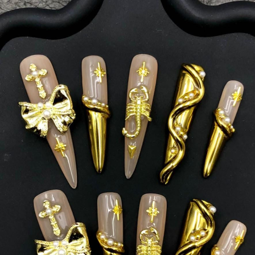 Golden Scorpion Luxe Press-On Nails Nude Stilettos with 3D Charms & Pearl Accents Manicure glue on artificial fake faux reusable trendy nail