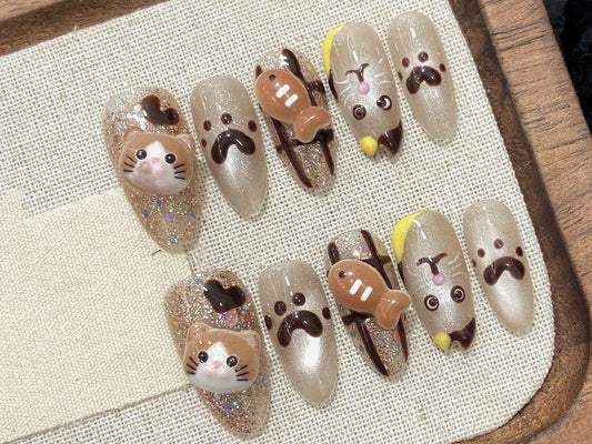 Playful Animal Cat Paw Prints and Cute Cat Design Press-On Nails with Sparkling Glitter Accents for Animal Lovers - Medium Oval Cartoon Nail