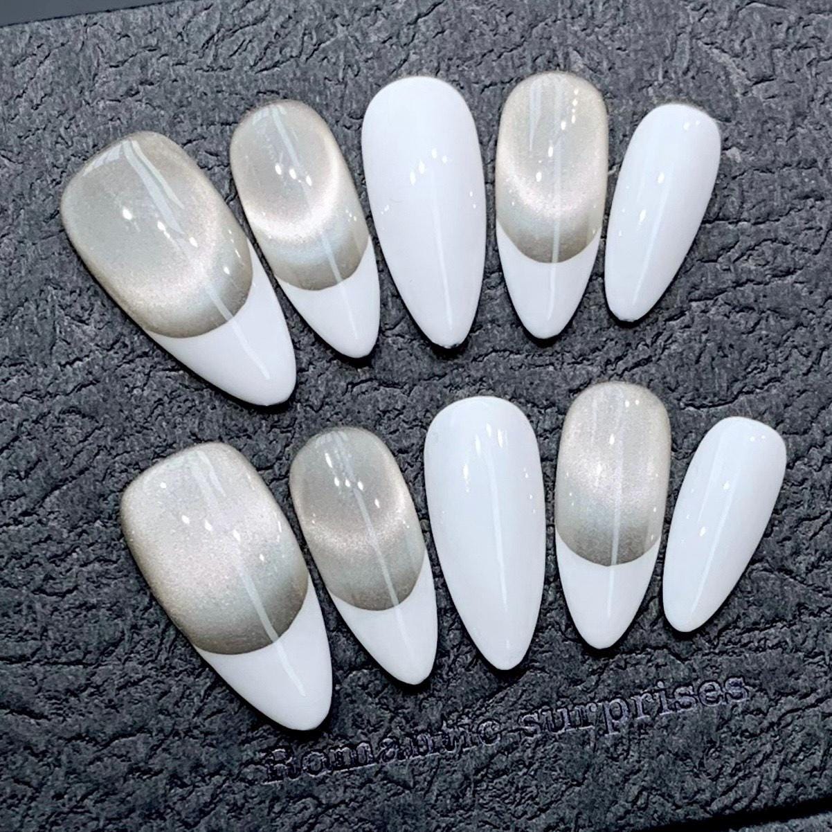 Elegant Metallic Champagne and White French Press-On Nails. Artificial reusable fake glue on faux manicure nails trendy art.