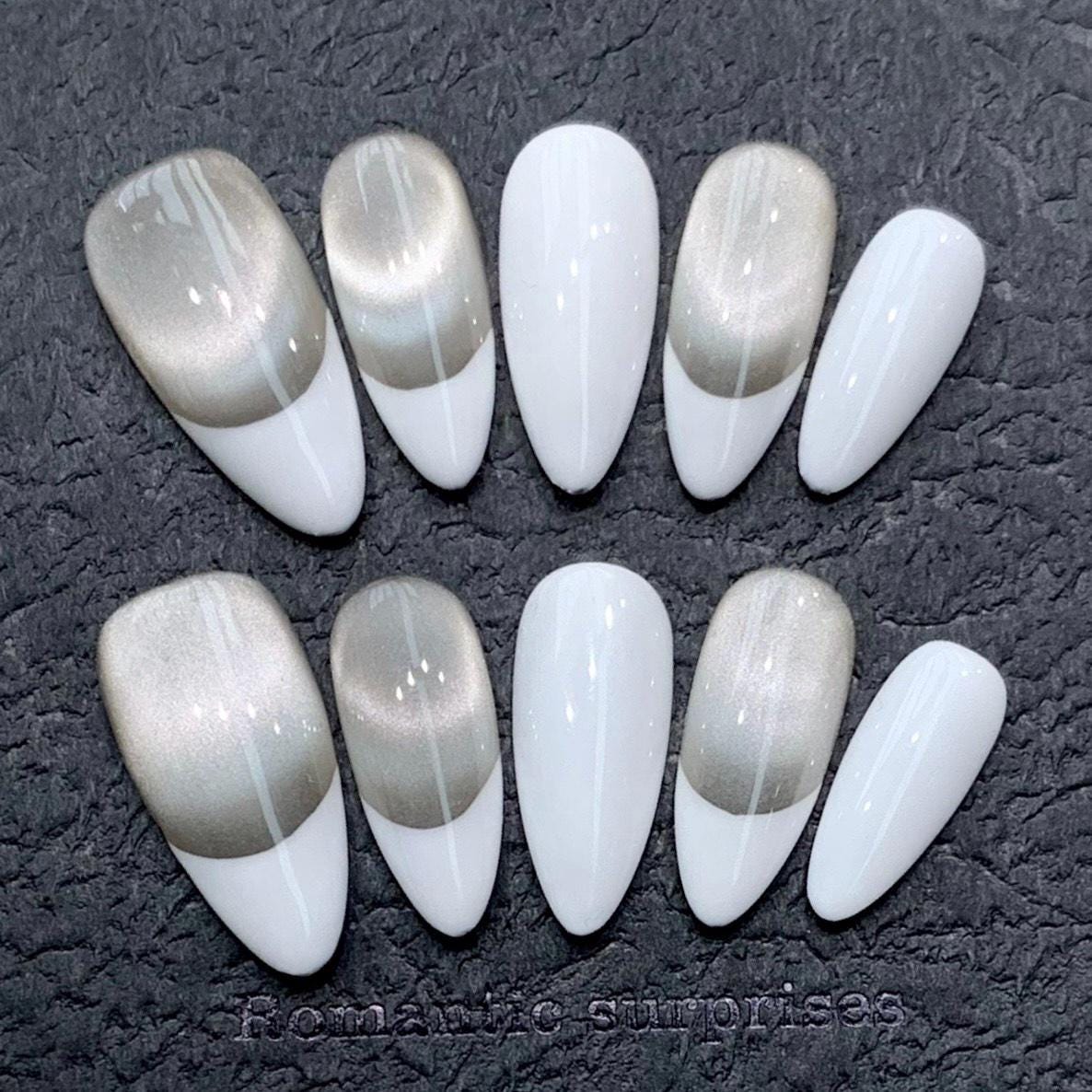 Elegant Metallic Champagne and White French Press-On Nails. Artificial reusable fake glue on faux manicure nails trendy art.
