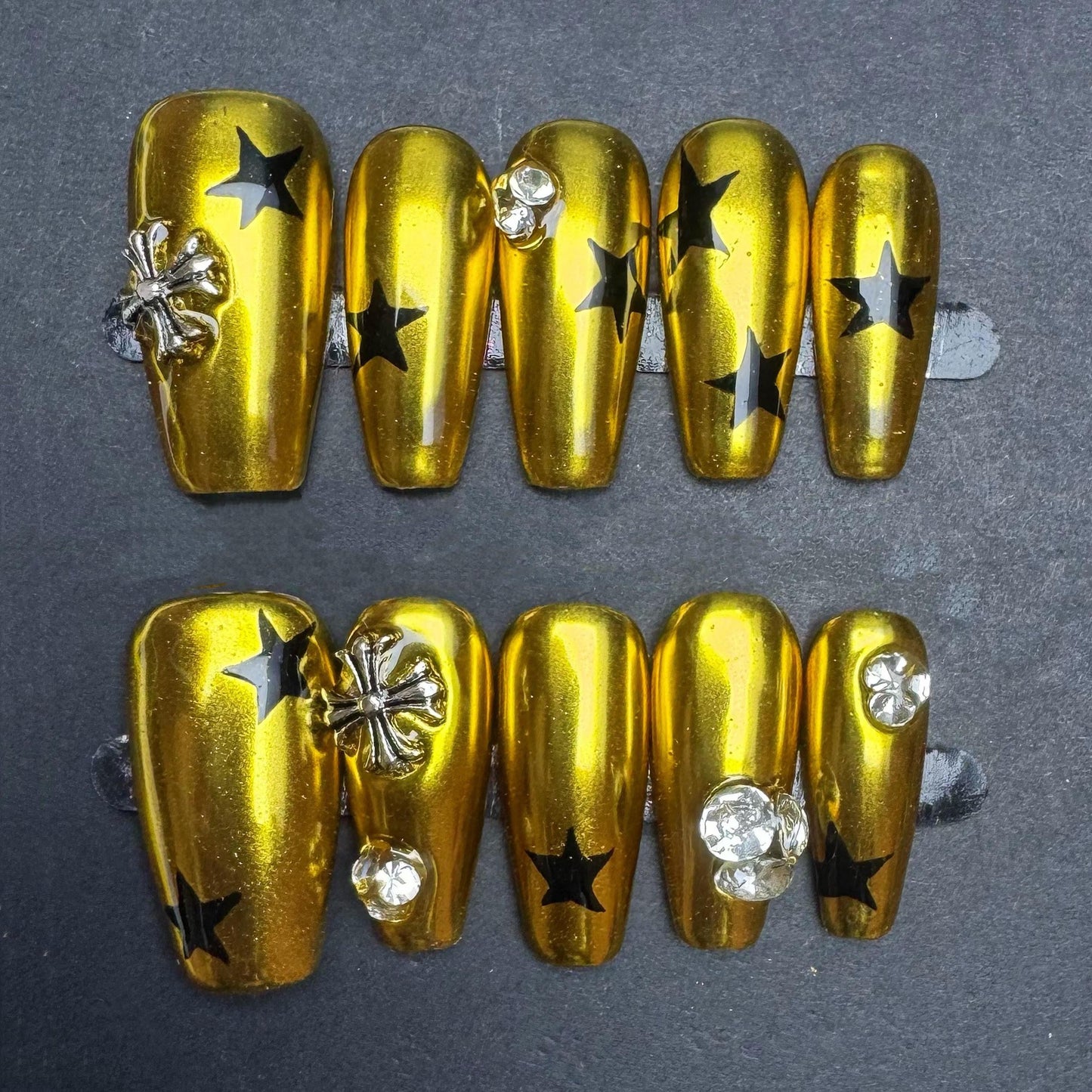 Gold Chrome Star Press On Nails with Rhinestones and Charms Glam Rock Style. Artificial reusable fake glue on faux manicure nails trendy art