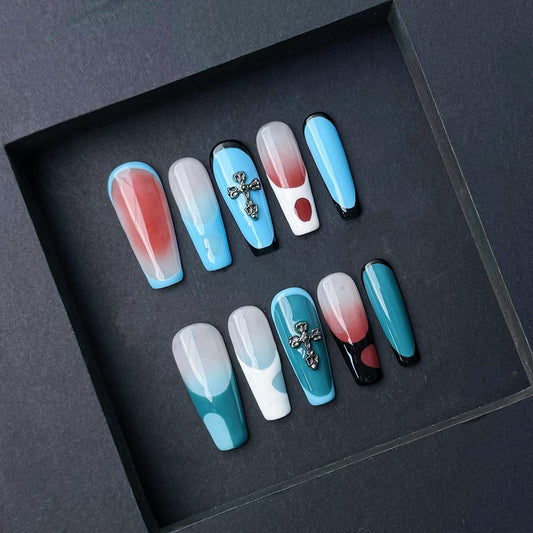 Modern Abstract Press On Nails with Cross Charm Red Teal and Sky Blue Color Blocking. Artificial fake glue on faux manicure nail trendy art.
