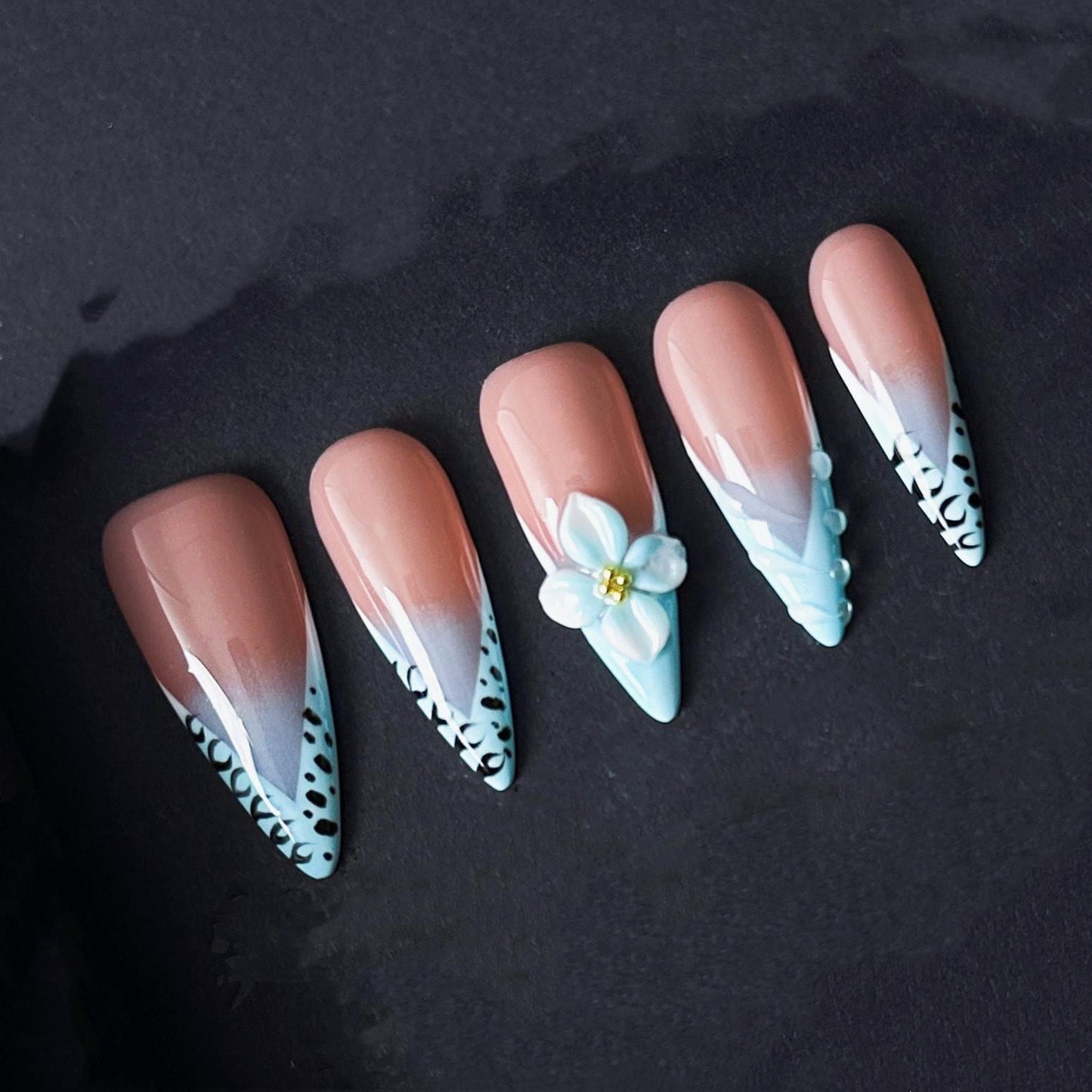 Blue French Tip Press On Nails with Leopard Edges and 3D White Flower Accents. Artificial reusable fake glue on manicure nails trendy art.