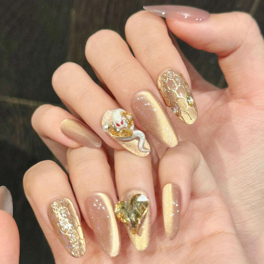 Gold Snake Charm Press On Nails with Honeycomb Glitter and Crystal Heart Accents artificial reusable fake glue on faux manicure nails trendy