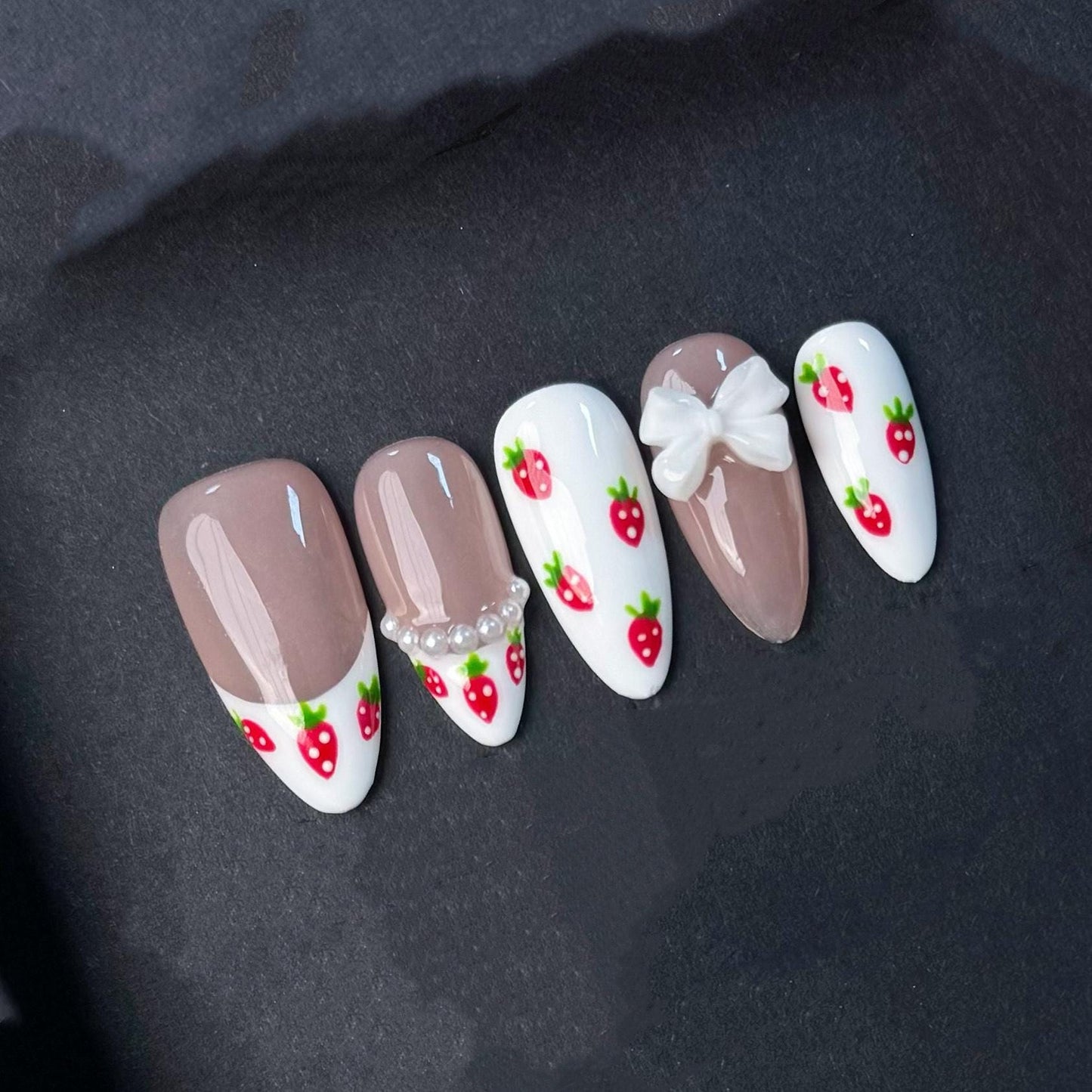 Cute Strawberry French Tip Nails with Pearls and Bows. Kawaii Press-On Set. Artificial reusable fake glue on faux manicure nails trendy art.
