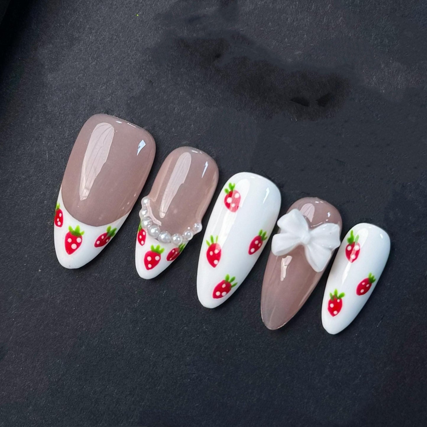 Cute Strawberry French Tip Nails with Pearls and Bows. Kawaii Press-On Set. Artificial reusable fake glue on faux manicure nails trendy art.