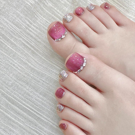 Pink Glitter Rhinestone Press-On Toenails with Sparkle Accent. Artificial reusable fake glue on faux manicure nails trendy art.