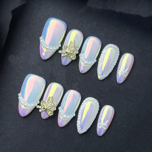 Iridescent Pearl Press-On Nails with 3D Bows and Beaded Accents. Artificial reusable fake glue on faux manicure nails trendy art.