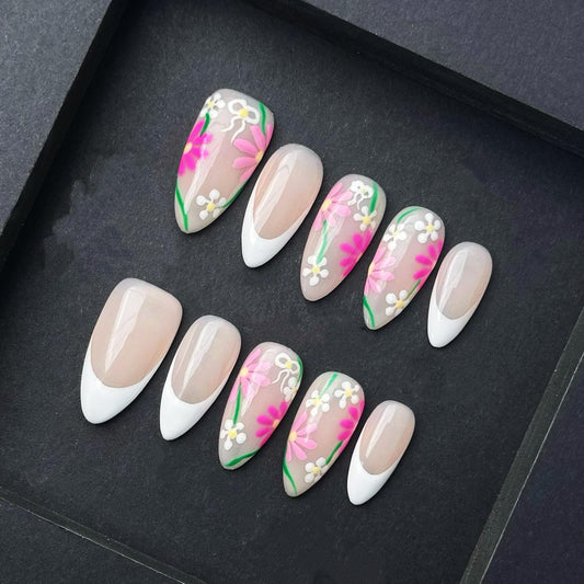 Pink Wildflower Meadow French Tip Press-On Nails with Hand painted Daisy Blooms. Artificial reusable fake glue on manicure nails trendy art.