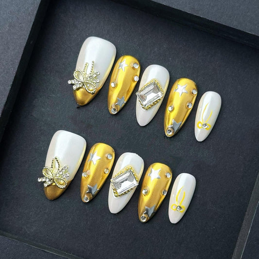 gold nails white nails star nails 3d nails bow nails rhinestone nails festive nails press on nails holiday nails elegant nails.