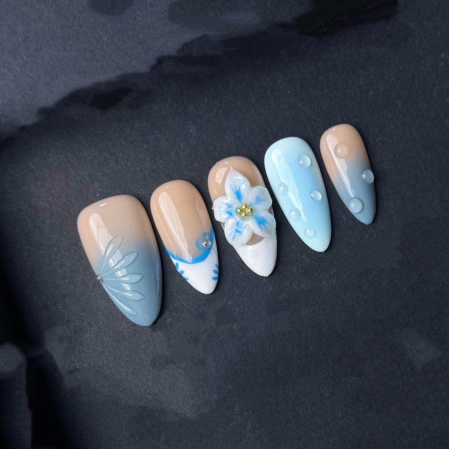 Soft Blue Gradient Floral Press-On Nails with 3D Embellishments. Artificial reusable fake glue on faux manicure nails trendy art.