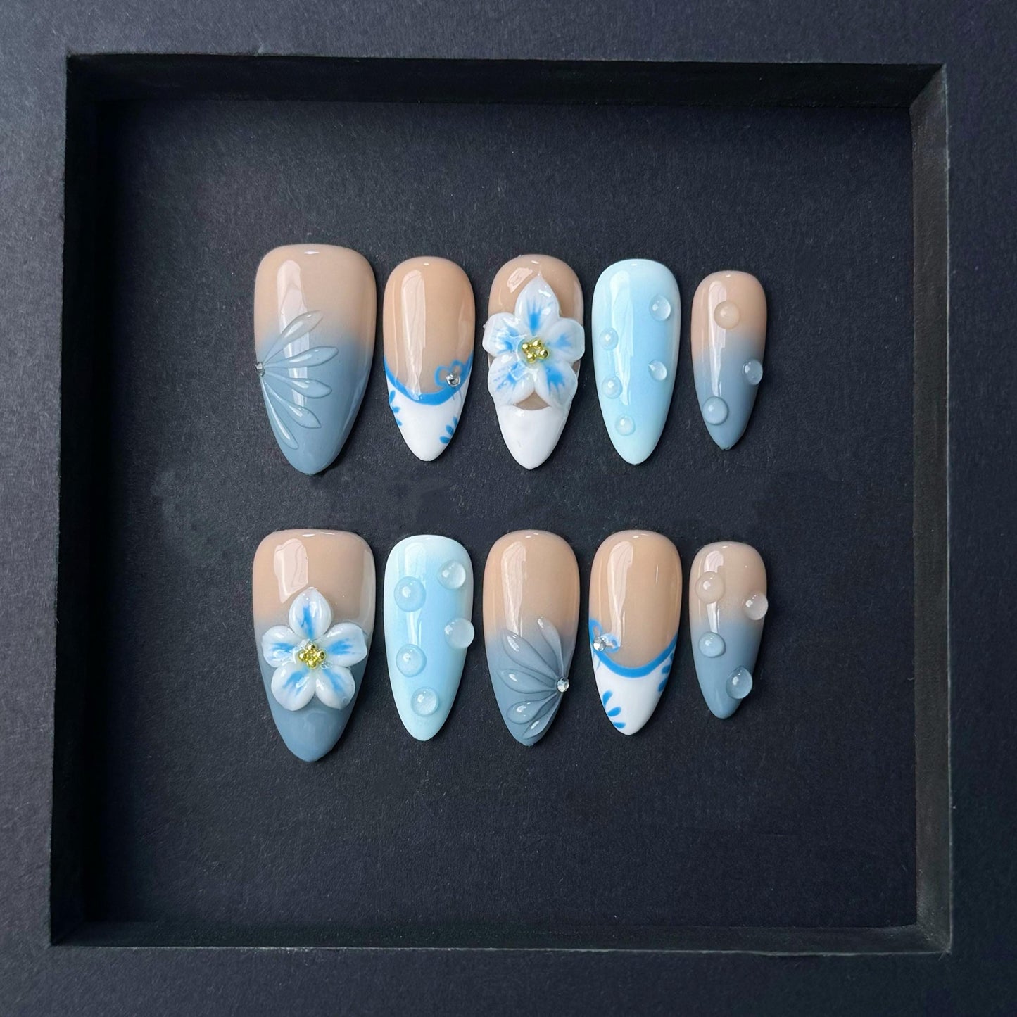Soft Blue Gradient Floral Press-On Nails with 3D Embellishments. Artificial reusable fake glue on faux manicure nails trendy art.