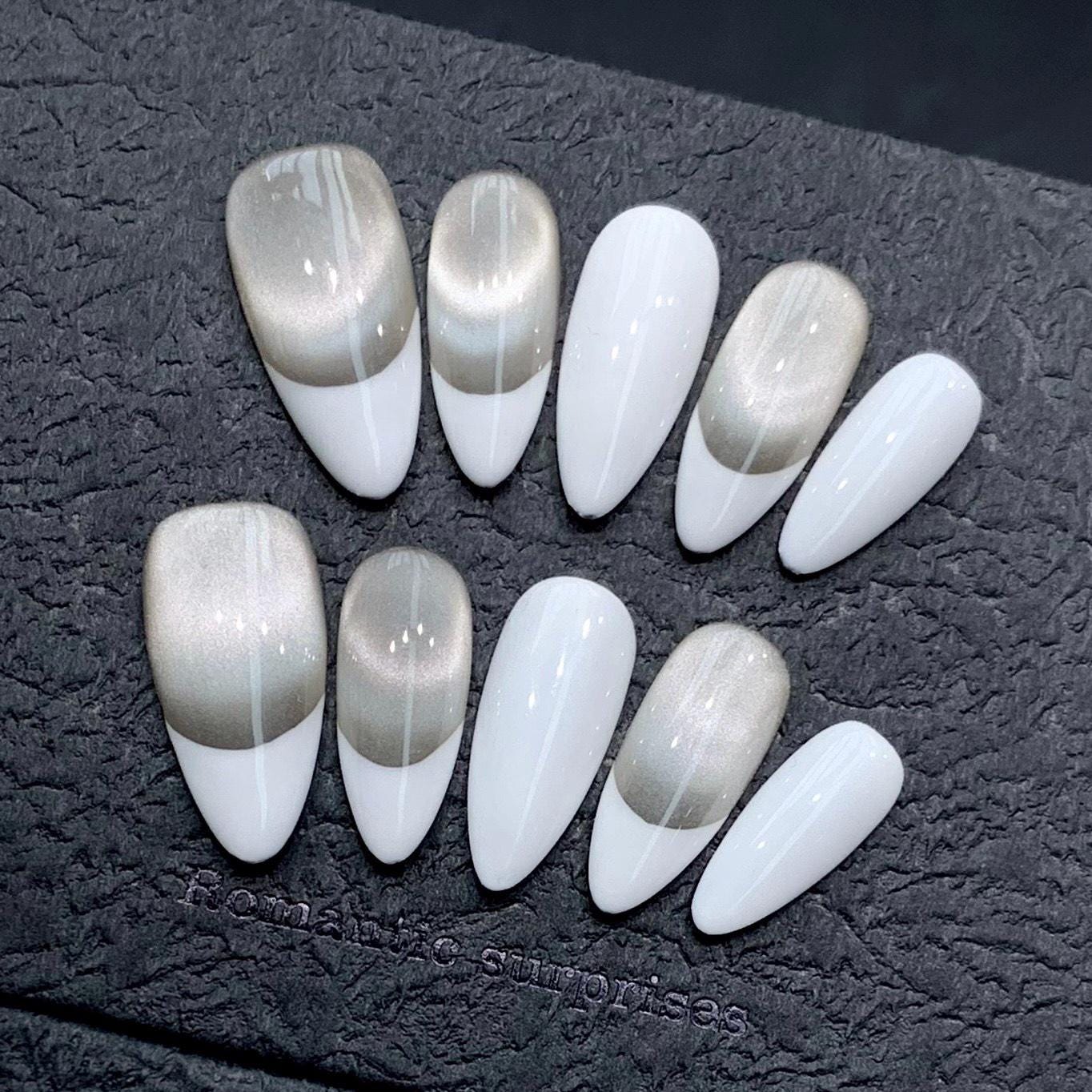 Elegant Metallic Champagne and White French Press-On Nails. Artificial reusable fake glue on faux manicure nails trendy art.