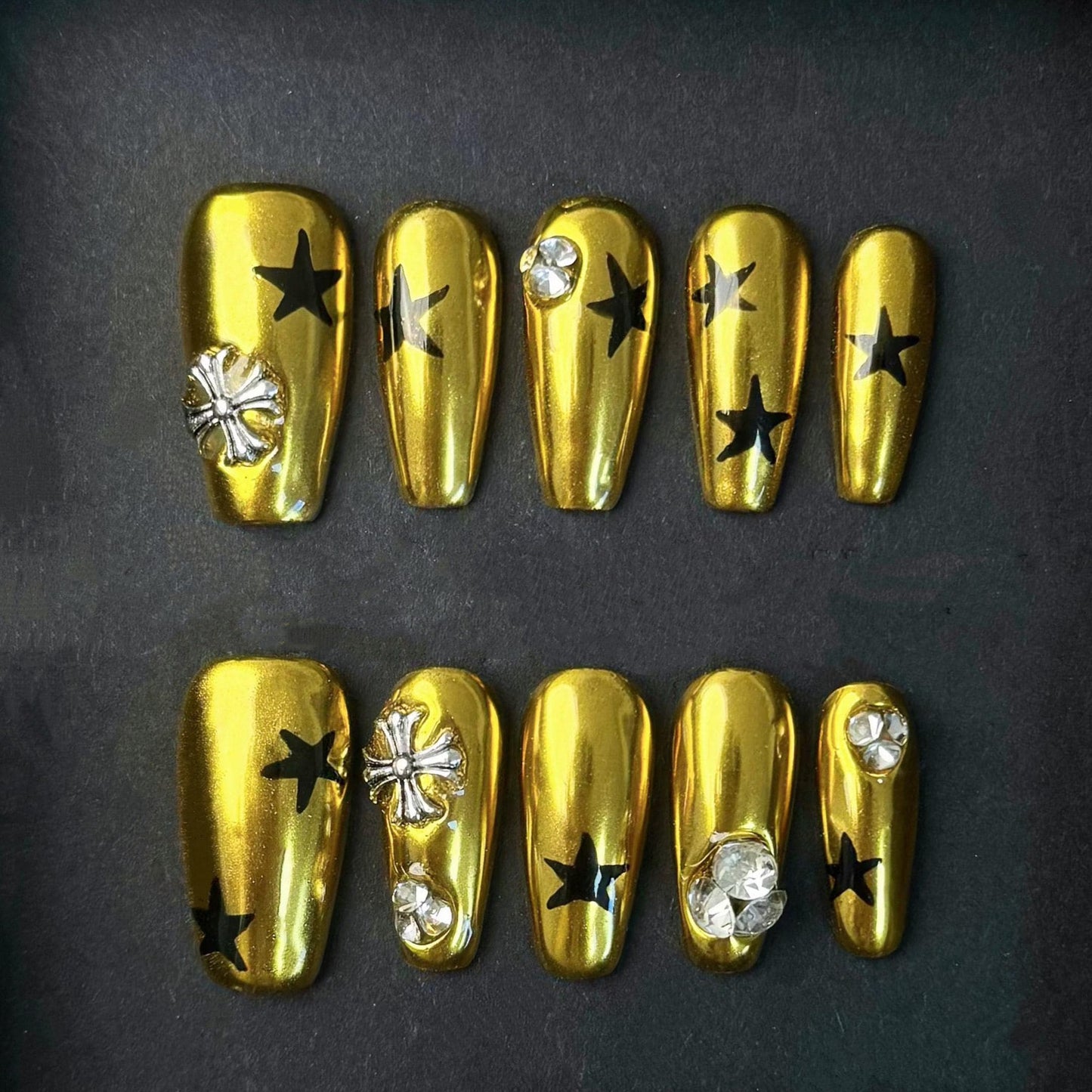 Gold Chrome Star Press On Nails with Rhinestones and Charms Glam Rock Style. Artificial reusable fake glue on faux manicure nails trendy art