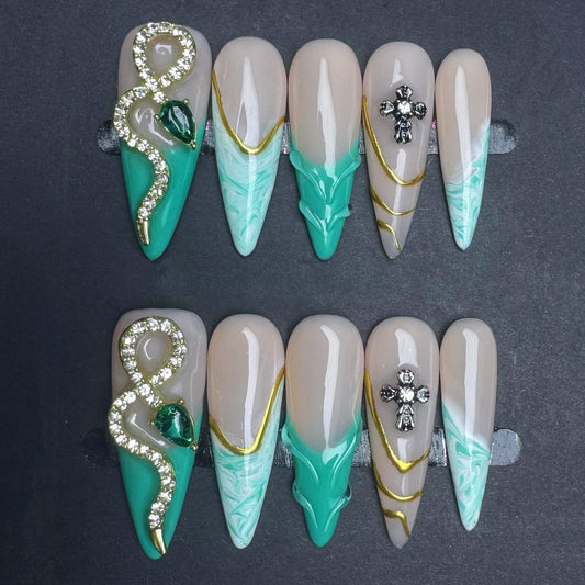 Emerald Green Snake Press On Nails –Long Almond Cross Charm Nails with Gold Foil & Marble Design. Artificial faux manicure nails trendy art.
