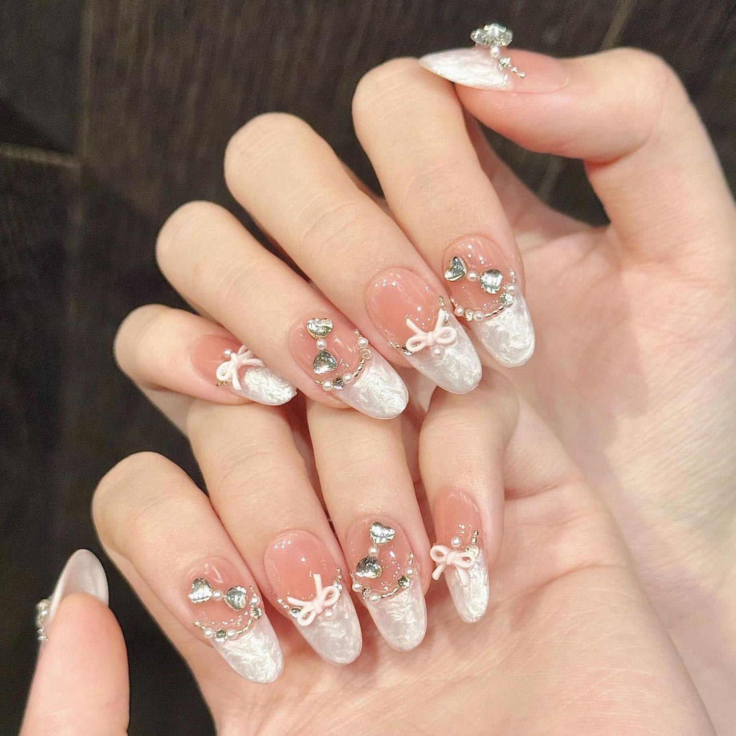 3D Lace French Press On Nails with Pink Bows Heart Charms and Crystals. Artificial reusable fake glue on faux manicure nails trendy art.
