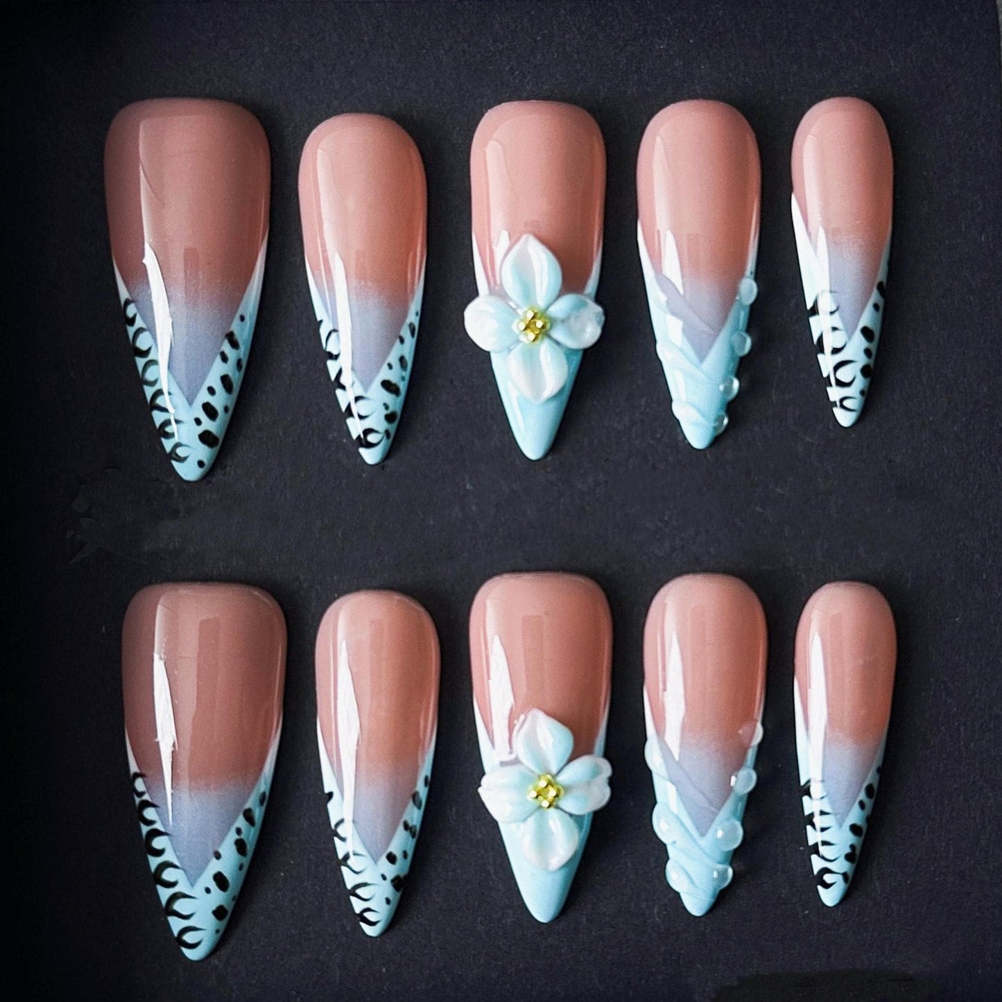 Blue French Tip Press On Nails with Leopard Edges and 3D White Flower Accents. Artificial reusable fake glue on manicure nails trendy art.
