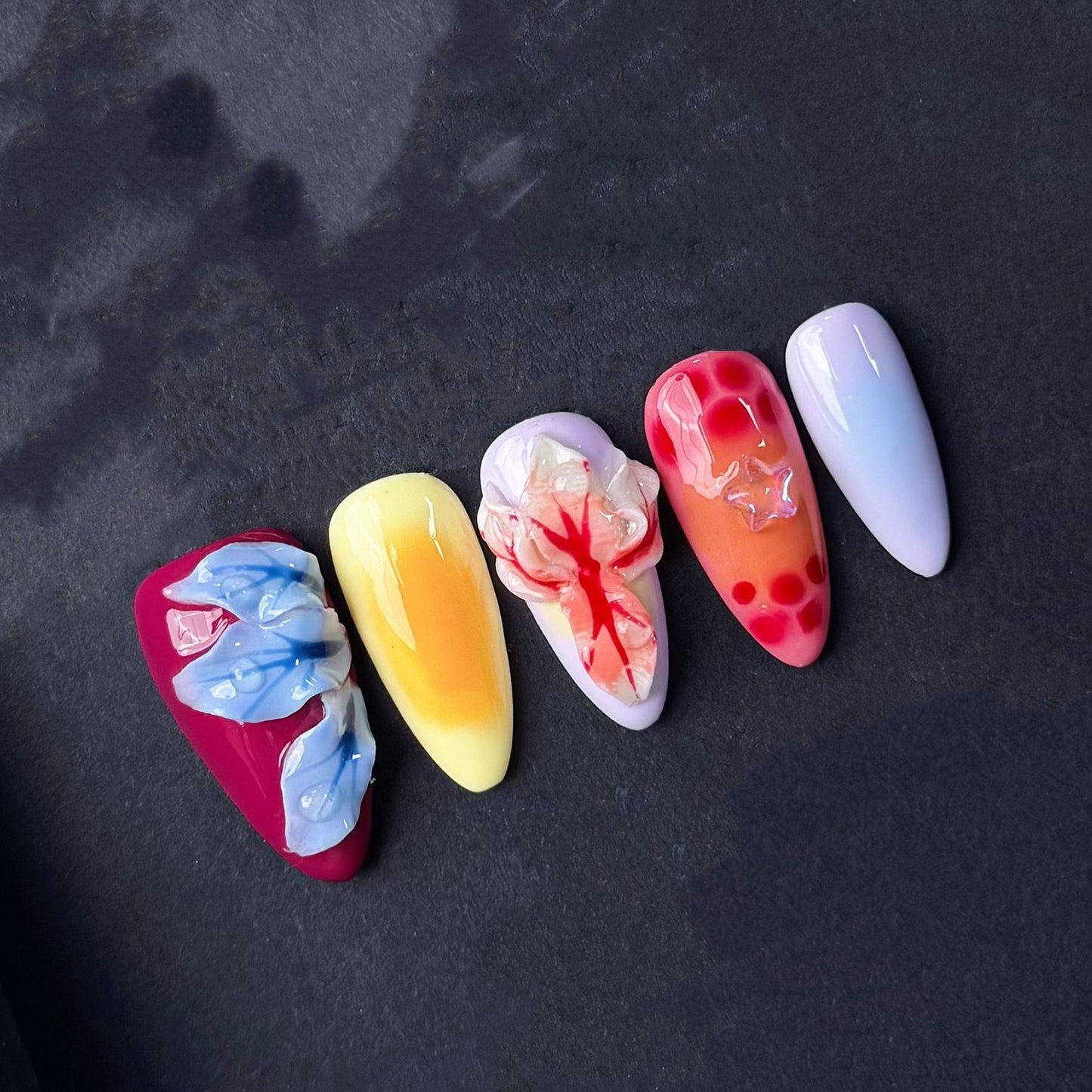 Tropical Sunset Press On Nails with 3D Flowers Fruit-Inspired Art and Star Accents. Artificial fake glue on faux manicure nails trendy art.