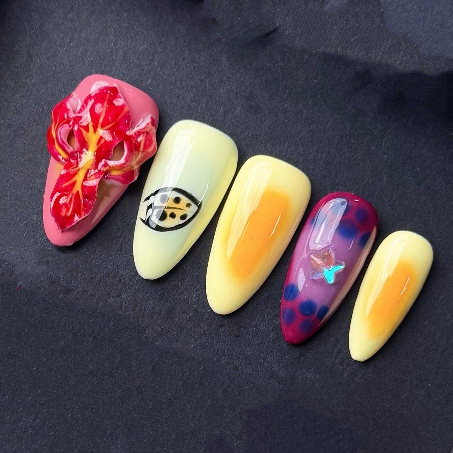 Tropical Sunset Press On Nails with 3D Flowers Fruit-Inspired Art and Star Accents. Artificial fake glue on faux manicure nails trendy art.