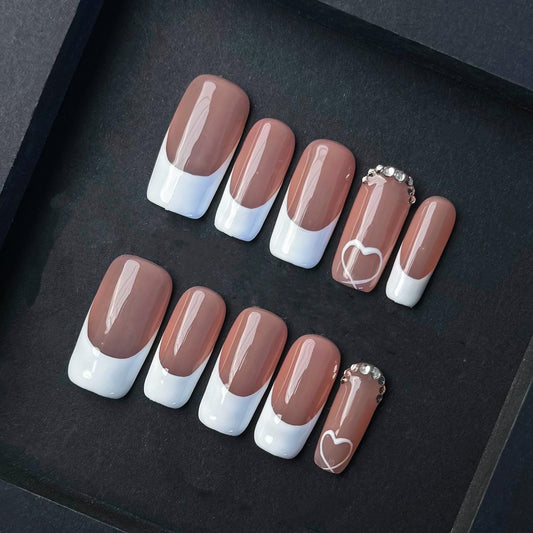 Classic Mocha French Tip Press On Nails with White Hearts and Rhinestone Accents. Artificial reusable fake faux manicure nails trendy art.