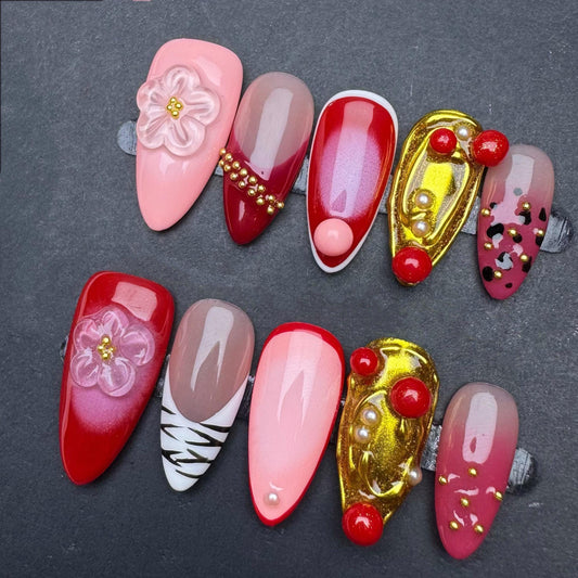 Romantic Red and Gold Press On Nails with 3D Flowers Pearl and Animal Print. Artificial reusable fake glue on faux manicure nail trendy art.