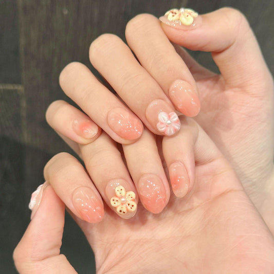 Peach Blossom Gradient Press-On Nails with 3D Floral Accents. Artificial reusable fake glue on faux manicure nails trendy art.