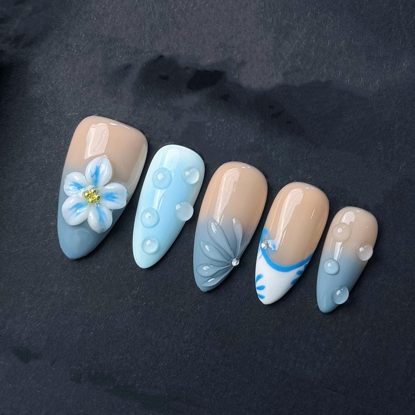 Soft Blue Gradient Floral Press-On Nails with 3D Embellishments. Artificial reusable fake glue on faux manicure nails trendy art.