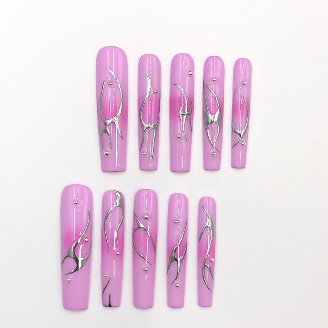Pink nails chrome long coffin nails, press-on nails, abstract nail art, glossy metallic accents elegant manicure, silver swirl trendy pink