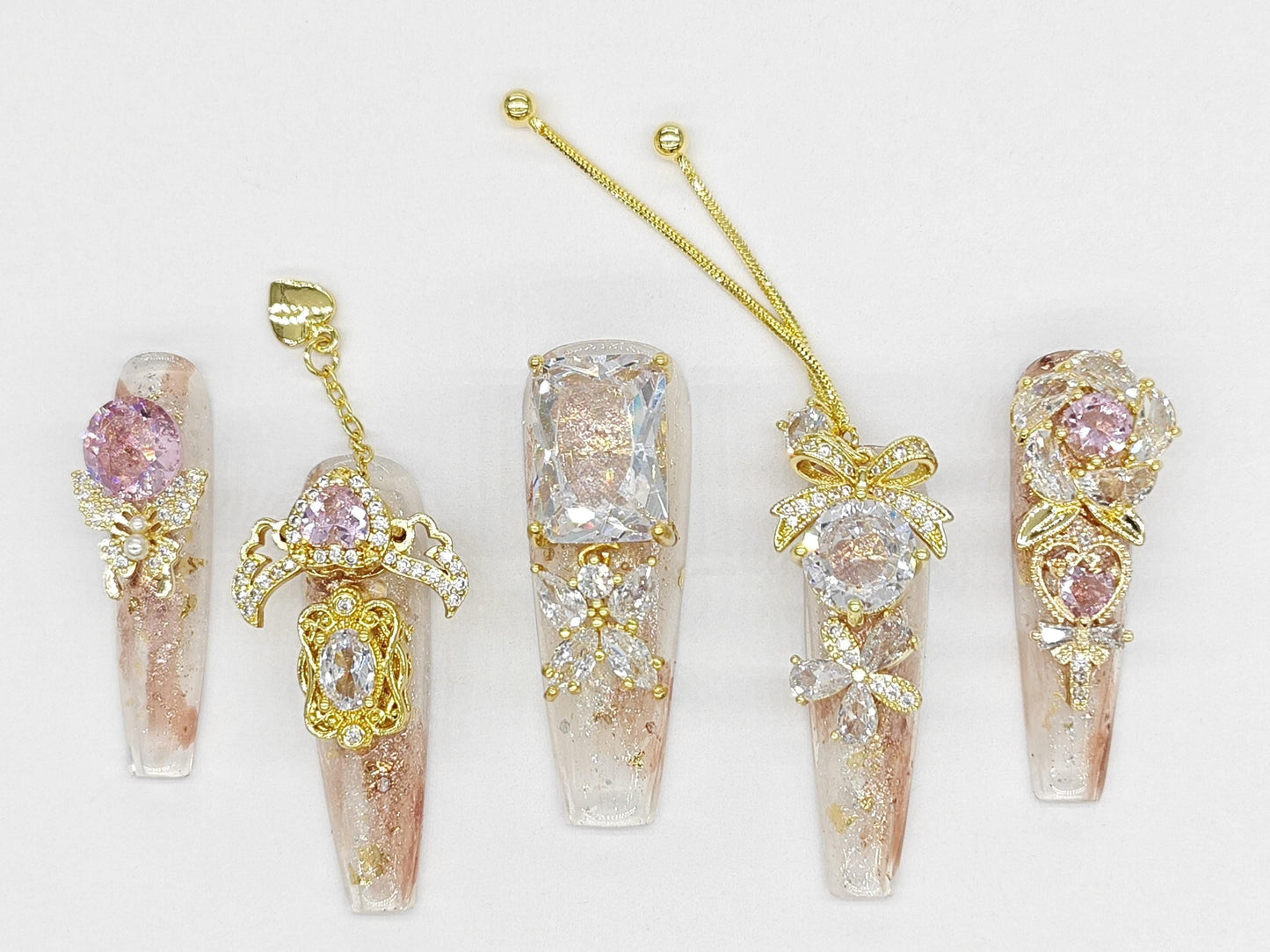 Opulent Blush & Gold Press-On Nails – 3D Pink Crystals, Butterflies, Bows, Luxe Charms on Sparkling Nude Base | Ultimate Glam Nail Set