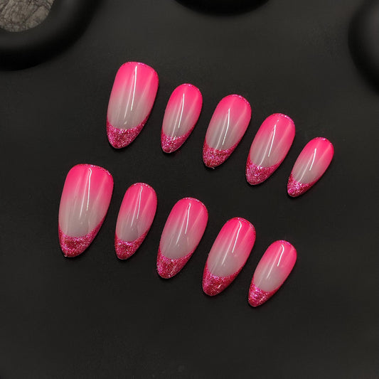 Hot Pink Glitter French Tip Press-On Nails, vibrant short almond nude base sparkling glitter bold babes and party ready artificial glue on