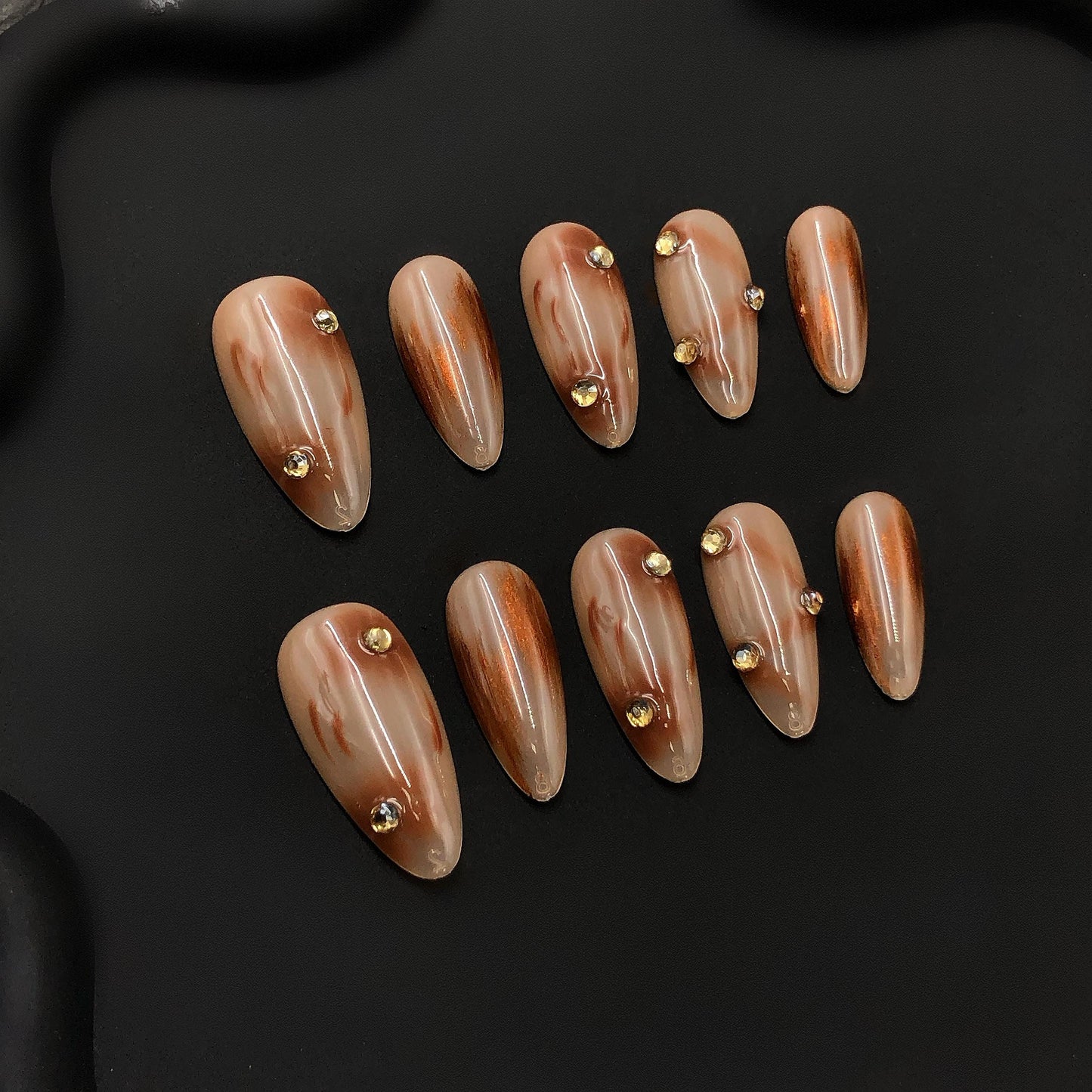 press-on nails nude almond shape glossy finish marble design rhinestone transparent elegant design handmade chic style brown accent luxury