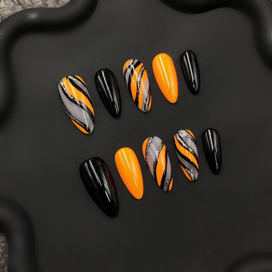 Halloween Hand Painted Press On Nails – Orange & Black Swirl Design, Glossy Almond Nails with Glitter Accents, Spooky Season Fake Nail Set