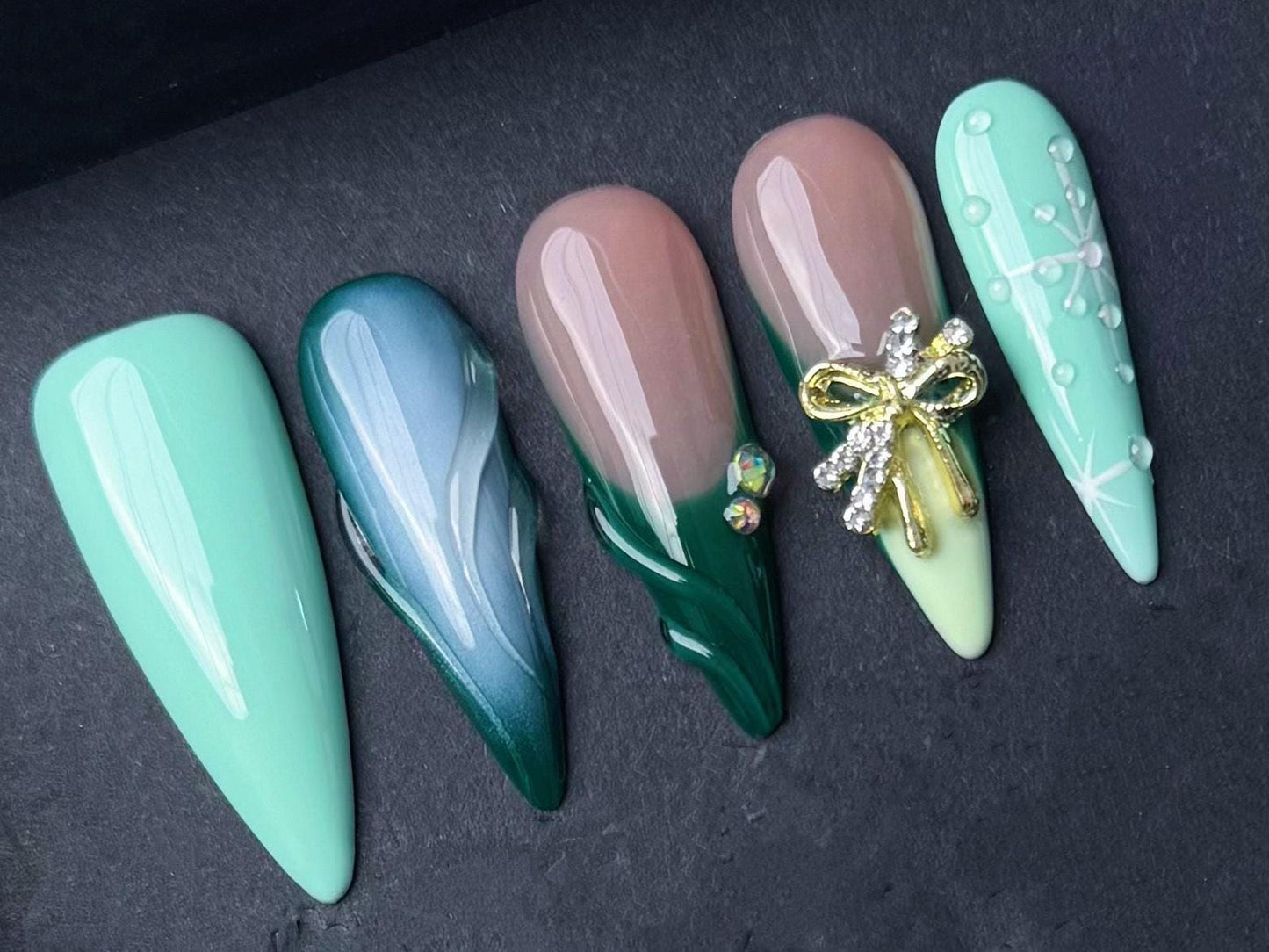 green gradient nails, mint and emerald nails, 3D bow art nude and green winter snowflake art press-on rhinestone holiday elegant green
