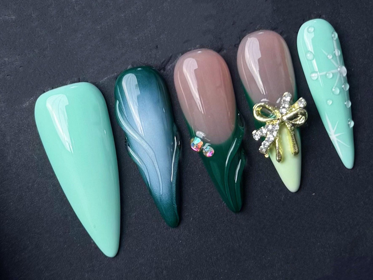green gradient nails, mint and emerald nails, 3D bow art nude and green winter snowflake art press-on rhinestone holiday elegant green