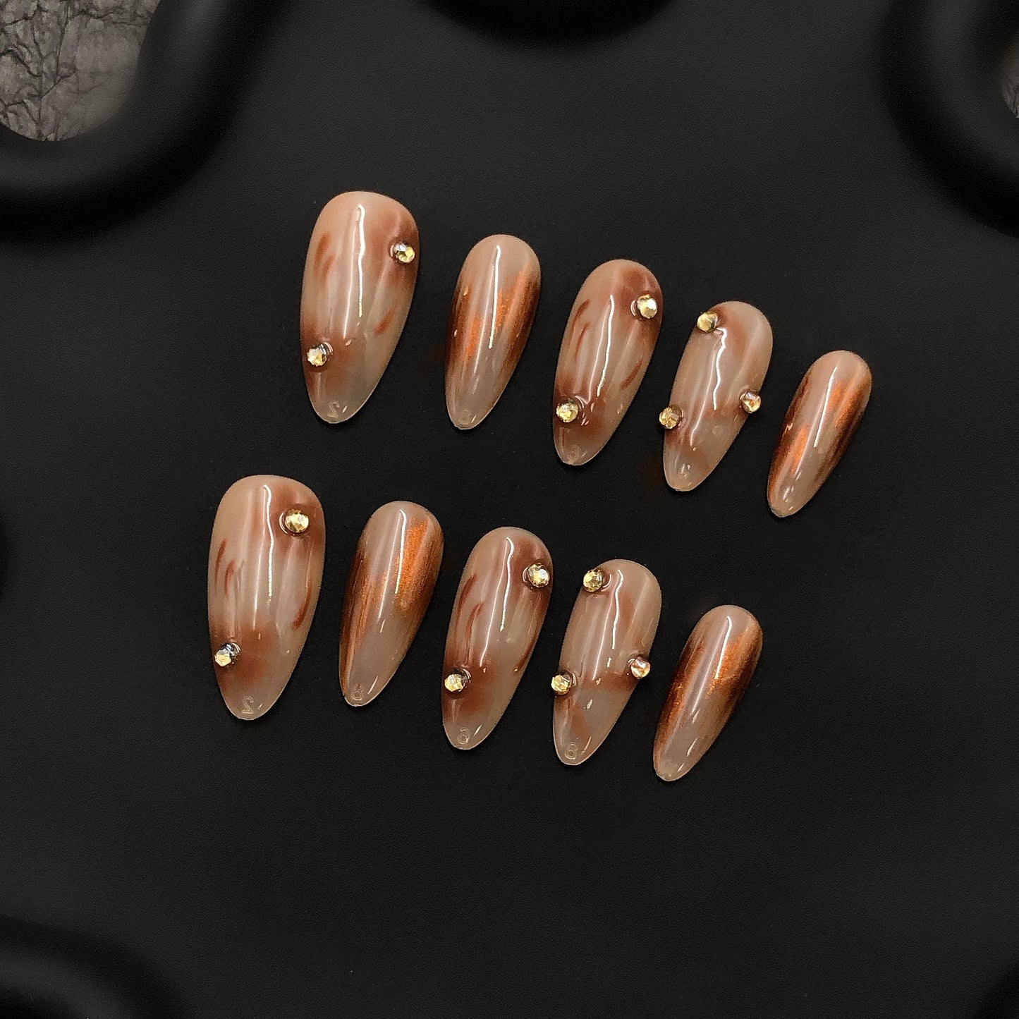 press-on nails nude almond shape glossy finish marble design rhinestone transparent elegant design handmade chic style brown accent luxury
