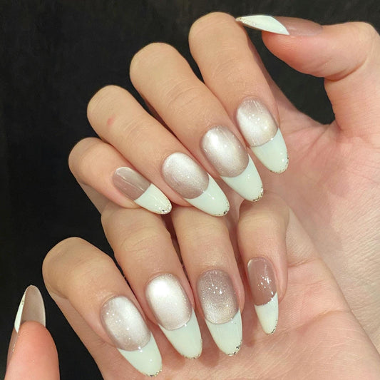 Champagne Pearl French Tip Press-On Nails – Oval Shimmer with Gold Detail. Artificial reusable fake glue on faux manicure nails trendy art
