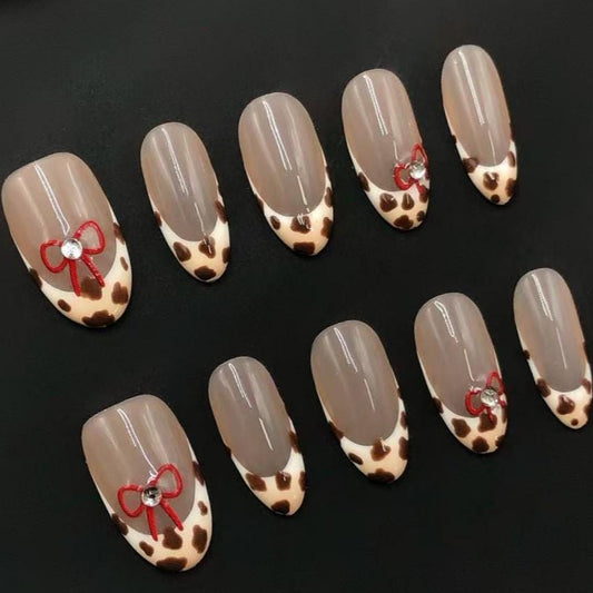 Cute Cow Print French Tip Press On Nails – Almond Shape with Bow Accent Artificial reusable fake glue on faux manicure nails trendy art
