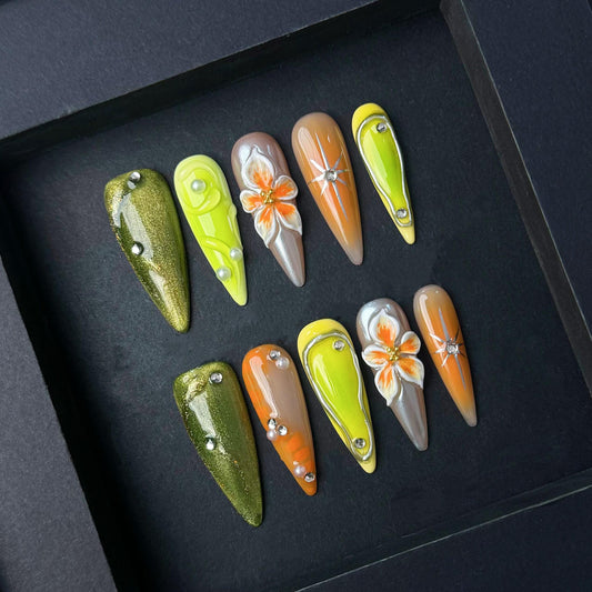 3D Orange Lily and Neon Green Chrome Press-On Nails – Long Stiletto. Artificial reusable fake glue on faux manicure nails trendy art.