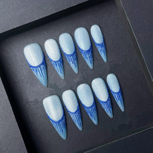 Icy Blue Glitter French Drip Press-On Nails – Stiletto Sparkle Set. Artificial reusable fake glue on faux manicure nails trendy art.